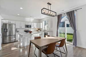 Quartz countertops, SS appliances, gas range, single-basin sink, & large pantry