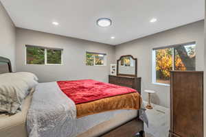 Bedroom with multiple windows and recessed lighting