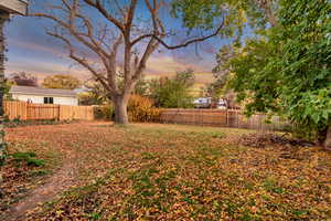 View of fenced backyard