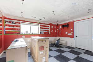 Misc room featuring dark floors