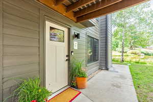 Property entrance with a lawn