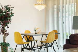 Dining area featuring a chandelier