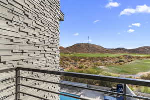 Mountain view featuring a local golf course