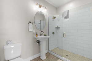 Bathroom featuring a stall shower and tile patterned floors