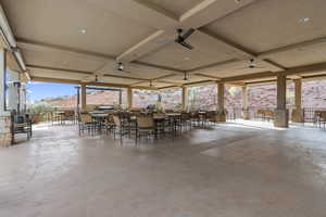 View of patio / terrace with outdoor dining area and a ceiling fan