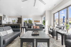 Living area featuring plenty of natural light, recessed lighting, light wood-type flooring, and ceiling fan