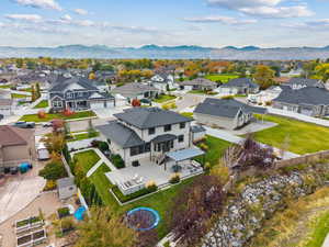 Aerial view of residential area with a mountain backdrop