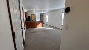 Empty room with carpet floors
