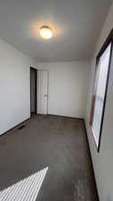 View of carpeted empty room