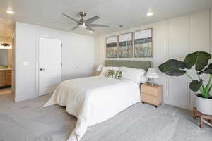 Bedroom featuring light carpet, a textured ceiling, ceiling fan, and recessed lighting