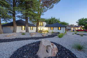 View of front of property with brick siding
