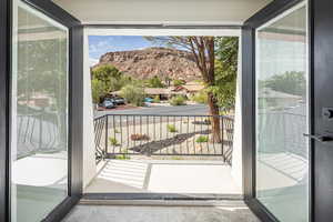 Doorway featuring a mountain view