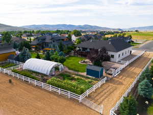 Aerial view of residential area featuring mountains