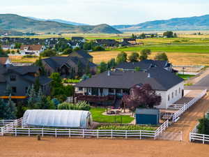 Aerial view of sparsely populated area with a mountainous background
