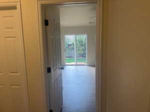 Corridor with dark wood finished floors