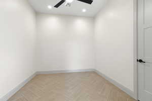 Spare room featuring recessed lighting and baseboards
