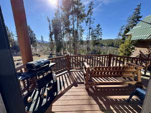 Wooden terrace with grilling area