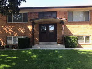 Close up of front porch of building that faces south