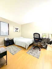 Bedroom featuring wood finished floors