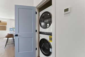 Laundry room with stacked washer / dryer