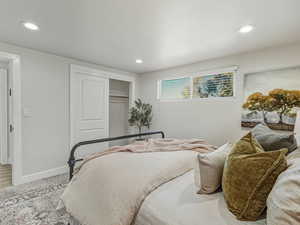 Bedroom with a closet and recessed lighting