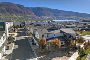 View of mountain background featuring nearby suburban area