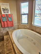 Bathroom with a whirlpool tub