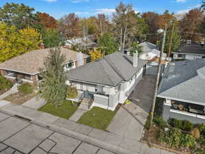 Aerial view of residential area with a tree filled landscape
