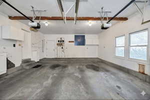 Virtually Staged or unstaged Garage with a garage door opener