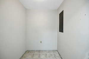 Unfurnished pantry or storage room with electric panel