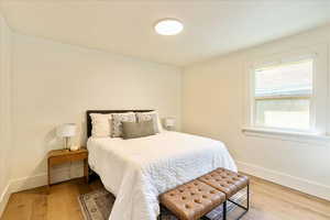 Bedroom featuring light wood-type flooring