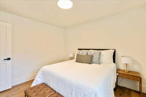 Bedroom featuring wood finished floors