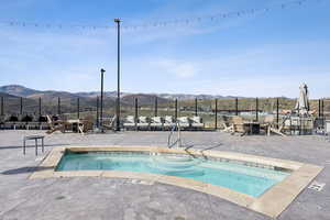 View of hot tub w mountain view