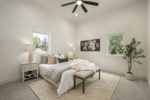 Primary bedroom with ceiling fan, and recessed lighting
