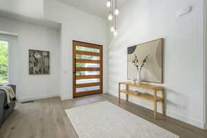 Foyer with custom front door