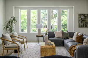 Living area featuring wood finished floors and baseboards