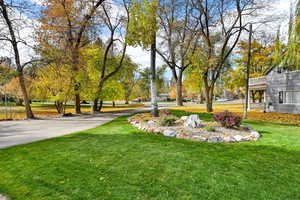 View of home's community featuring a lawn
