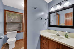 Bathroom with vanity and light tile patterned flooring