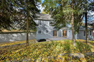 Back of property with a patio area