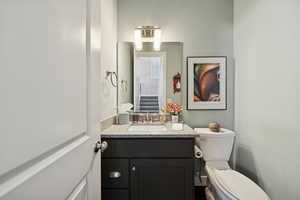 Bathroom with vanity and toilet