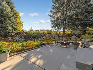 View of patio / terrace with a fire pit