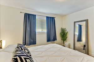 Bedroom featuring baseboards