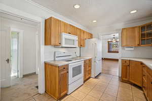 Open Kitchen w/Newer Cabinets.