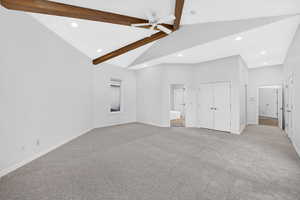 Unfurnished bedroom with a ceiling fan, light carpet, a closet, recessed lighting, and ensuite bathroom
