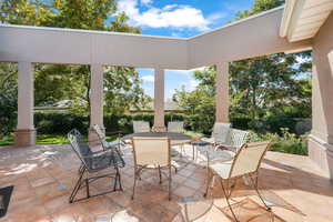 View of patio with outdoor dining space
