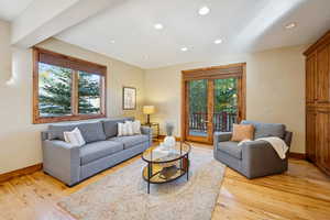 Living room featuring recessed lighting and light wood-style flooring