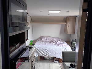 Bedroom featuring light wood-type flooring