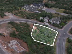 Aerial overview of property's location featuring nearby suburban area and property boundaries highlighted - approximate lot lines shown