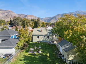 Aerial view of residential area featuring mountains