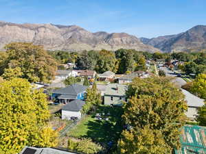 Aerial view of residential area featuring mountains